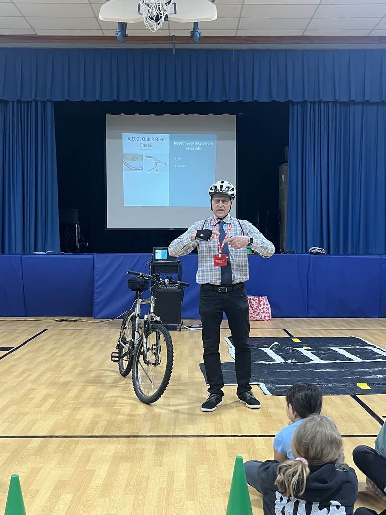Presenter shares the importance of riding without distractions