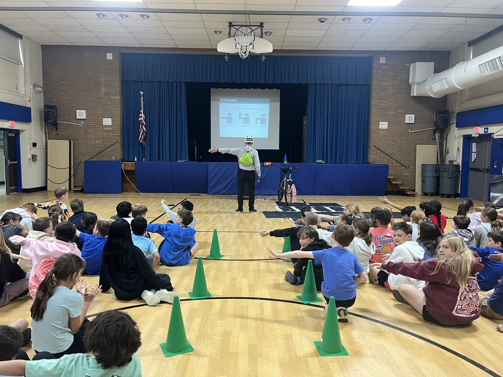 Presenter leads students in hand signals