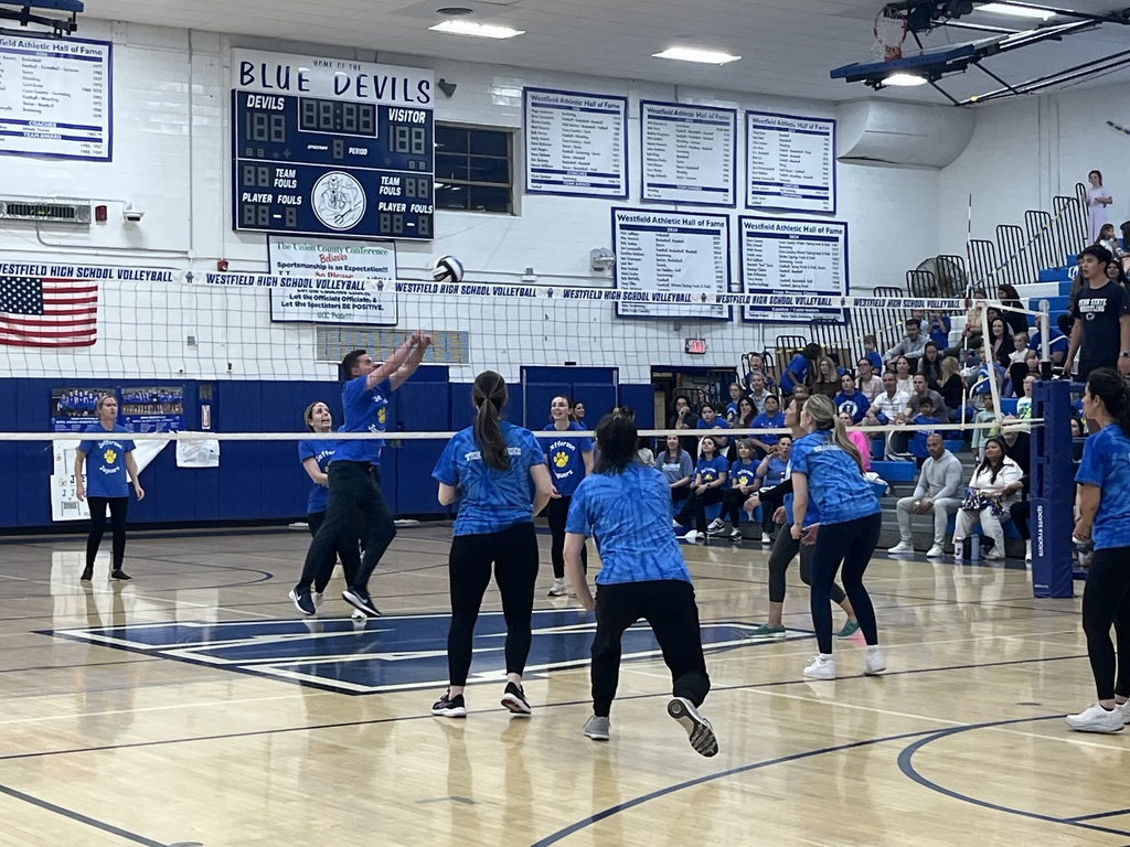 Mr. Marino taps the ball over.
