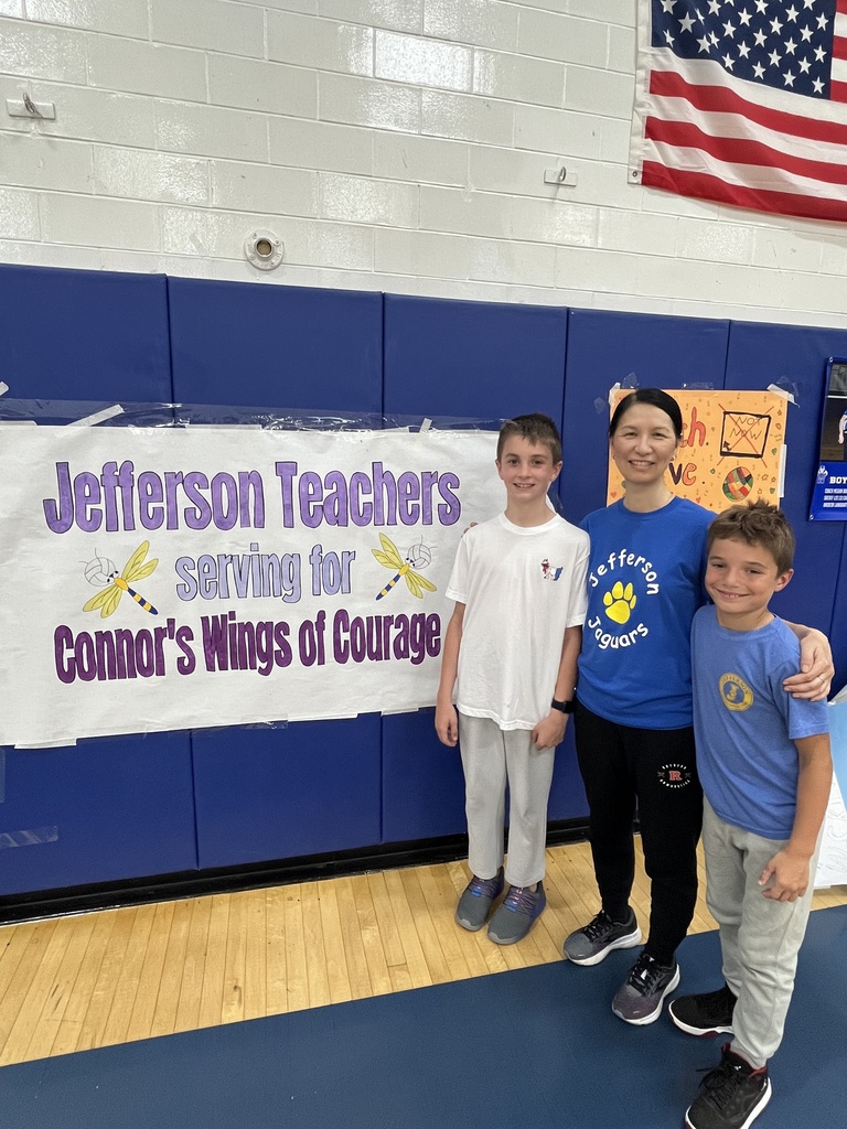 Dr. Hung photographed with two 5th graders