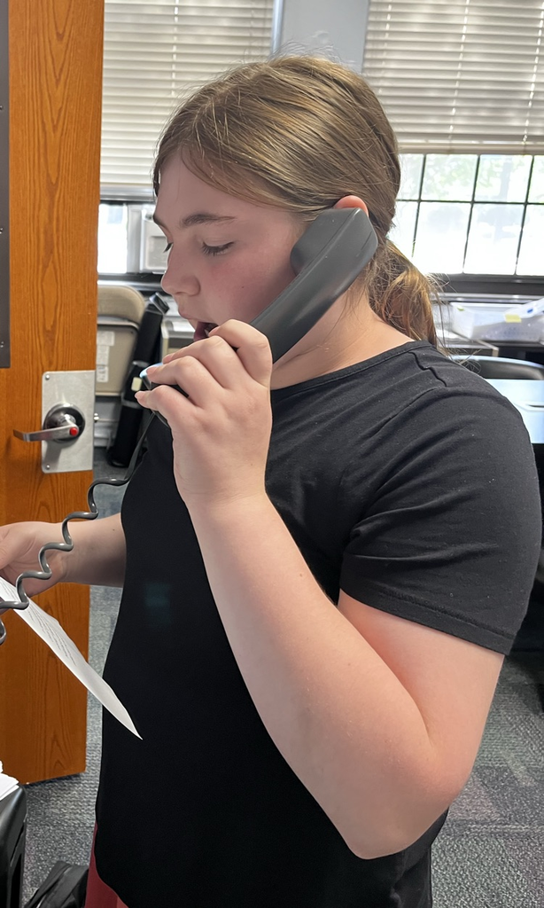 student making announcements