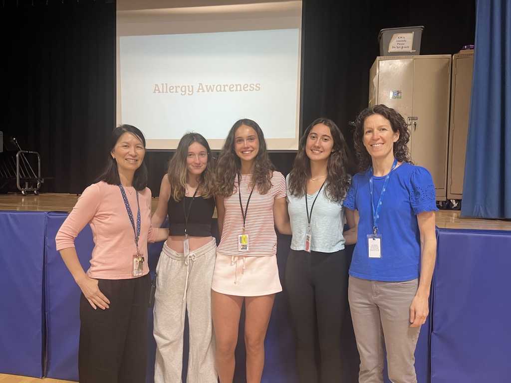 Dr. Hung is photographed with the 3 WHS students and their club advisor, Mrs. Doyle.