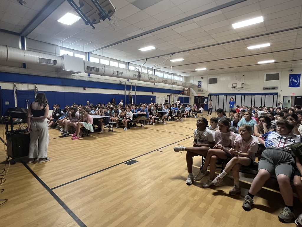 Students listening and learning about food allergies and how to stay safe.