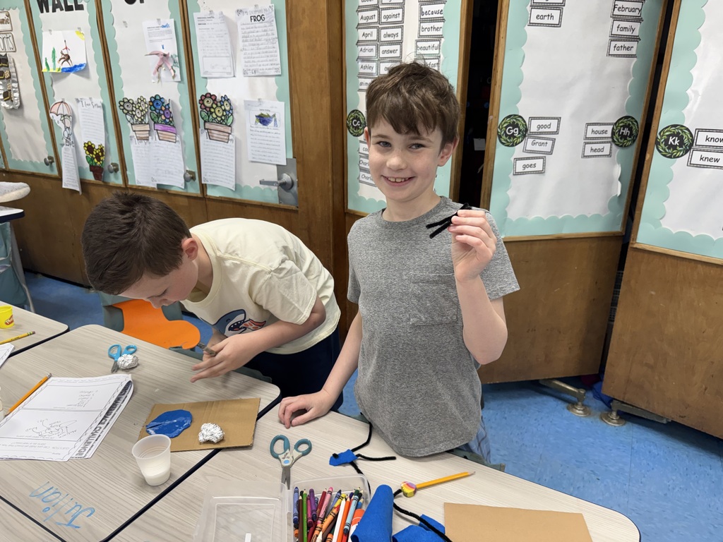 Students creating their insect.