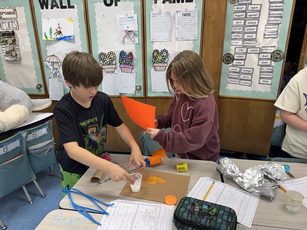 Students creating their insect.