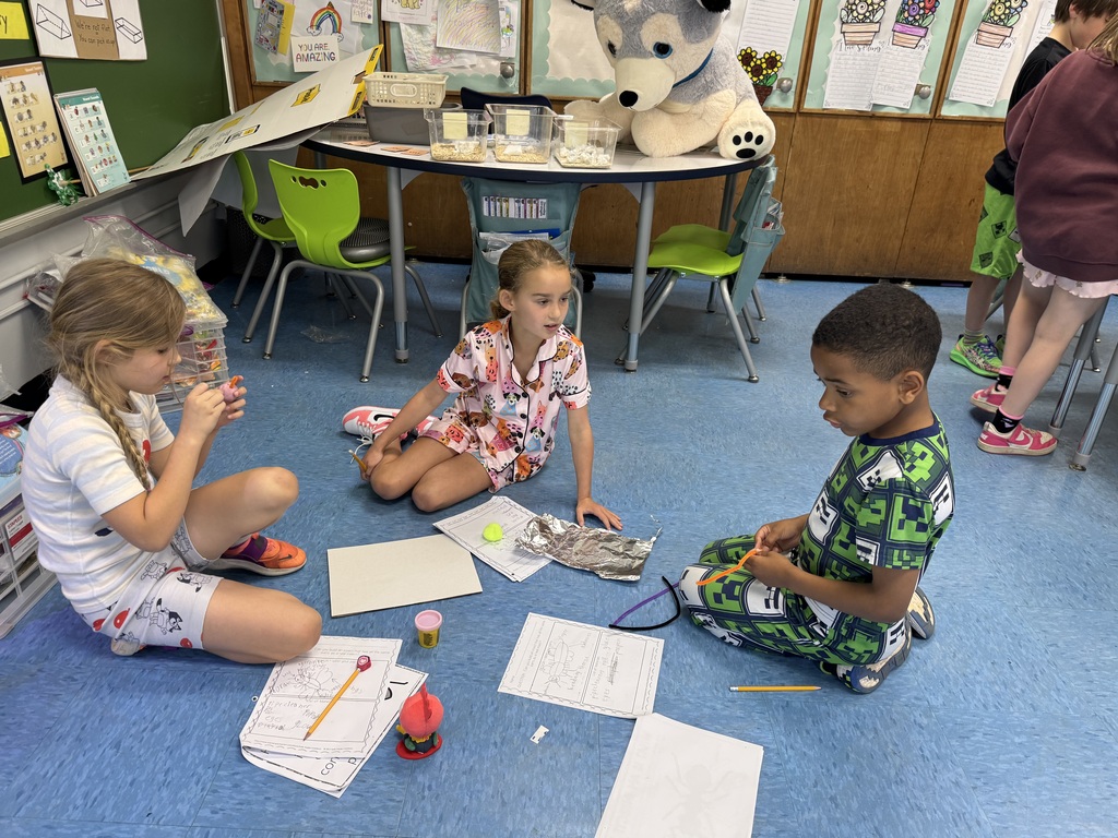 Students creating their insect.
