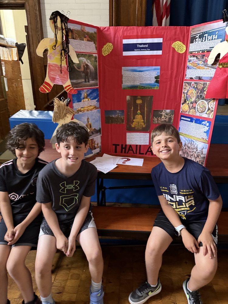 students with their country presentation project