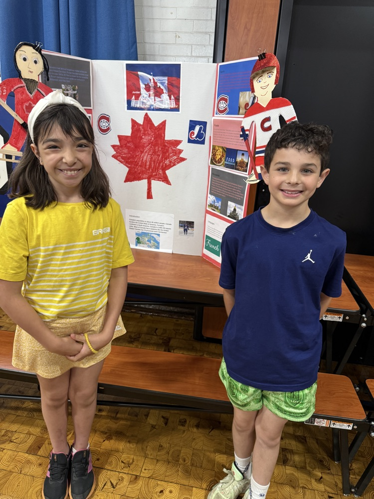students with their country presentation project