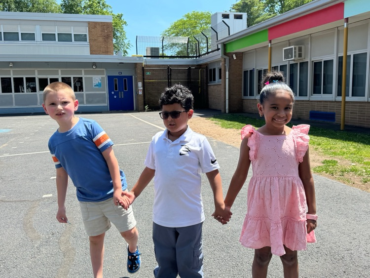 students pose during first grade orientation