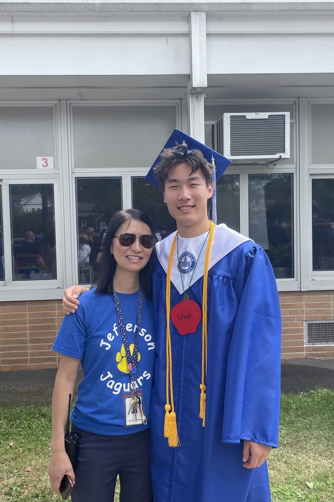 Principal takes a photo with WHS senior.