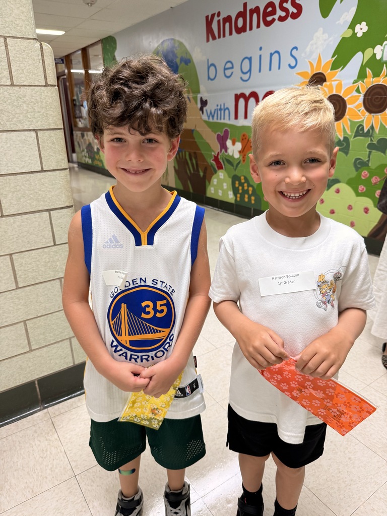 New students holding their pencil pouch