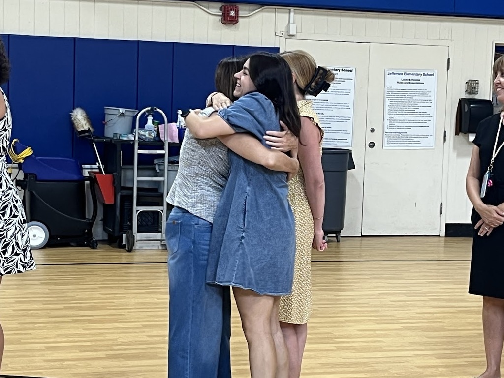 Teachers hugging