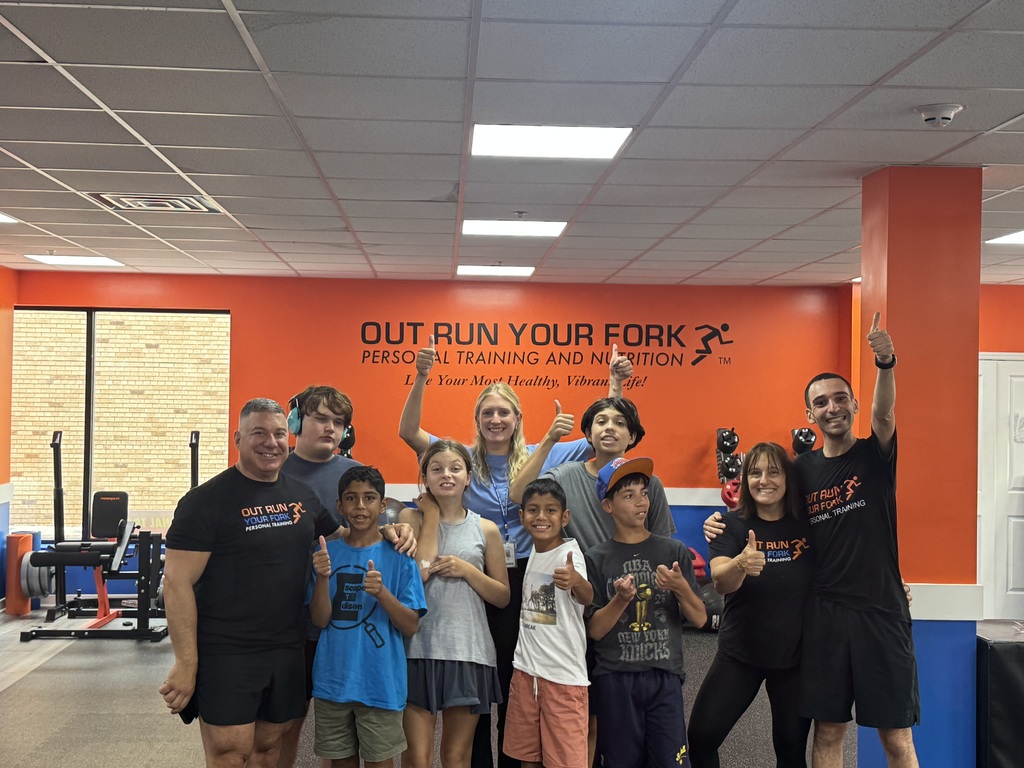 Students posting with the trainer