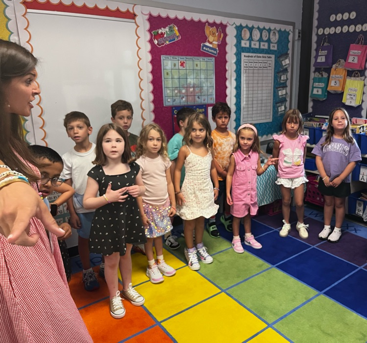 students starting their day in classrooms