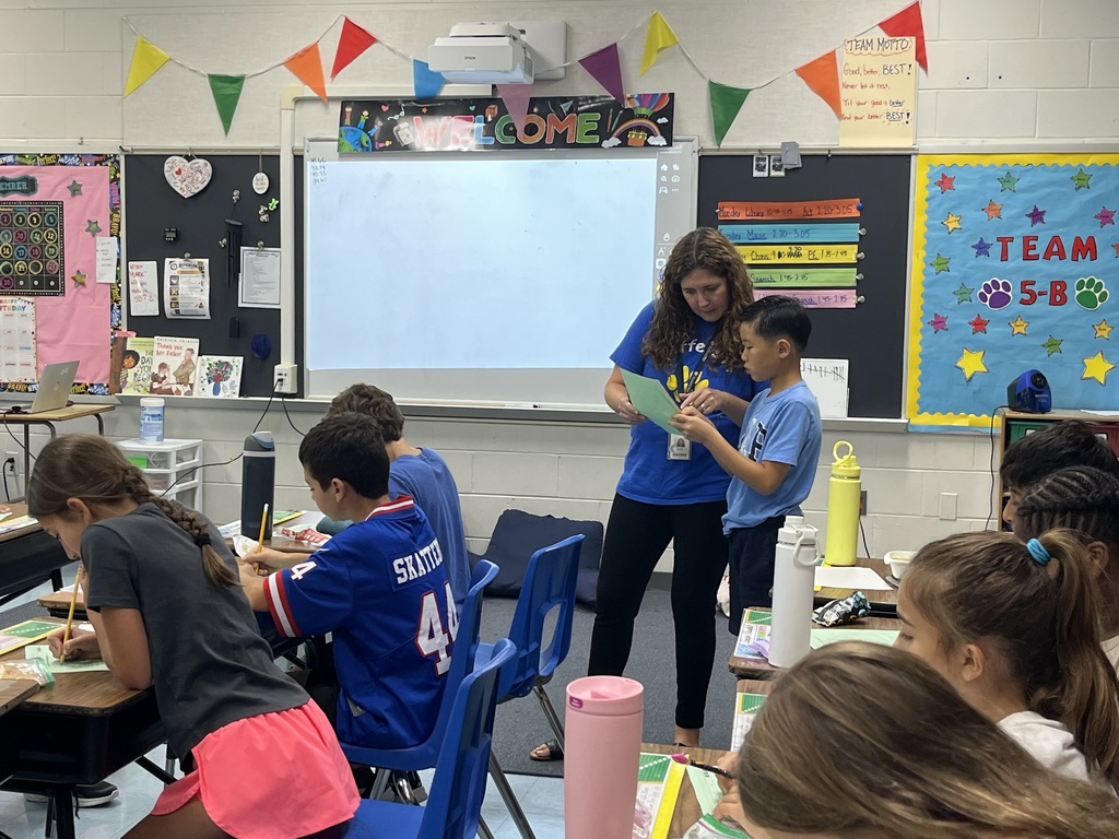 Teacher provides clarification for the math problem.