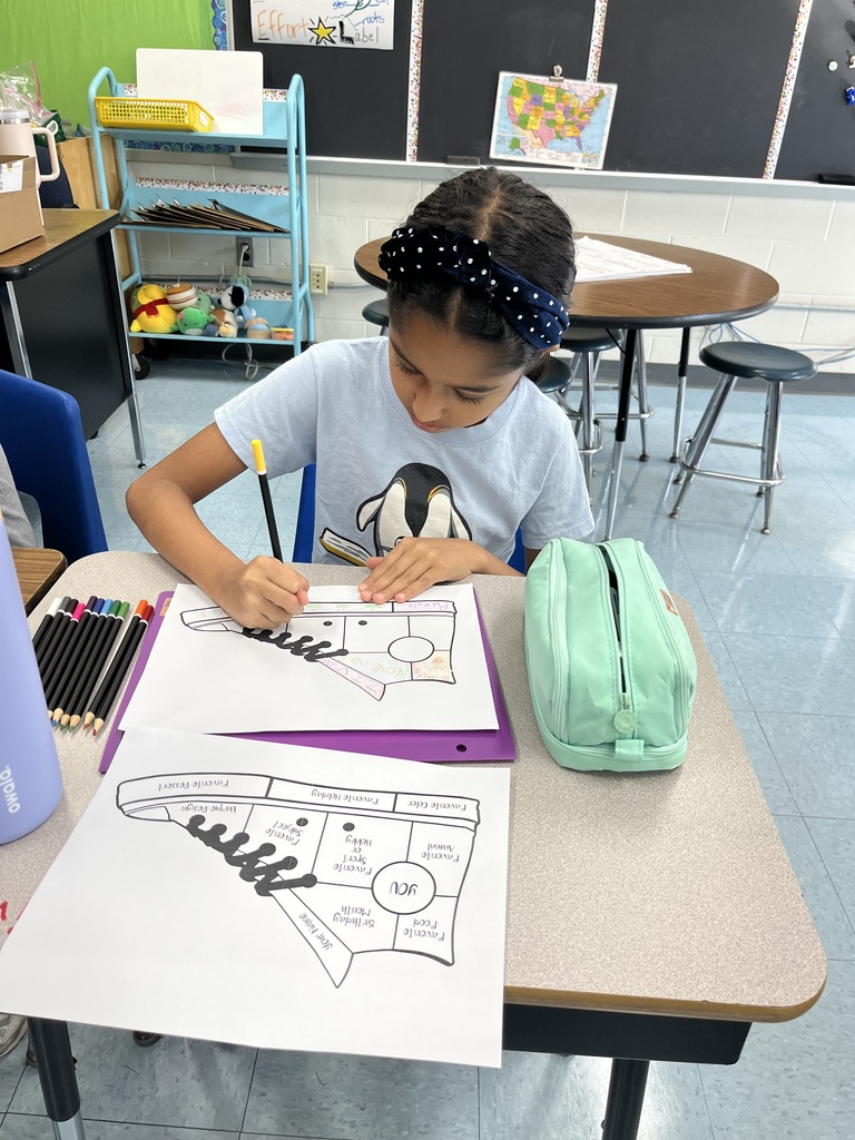 Student completing a get to know you activity.