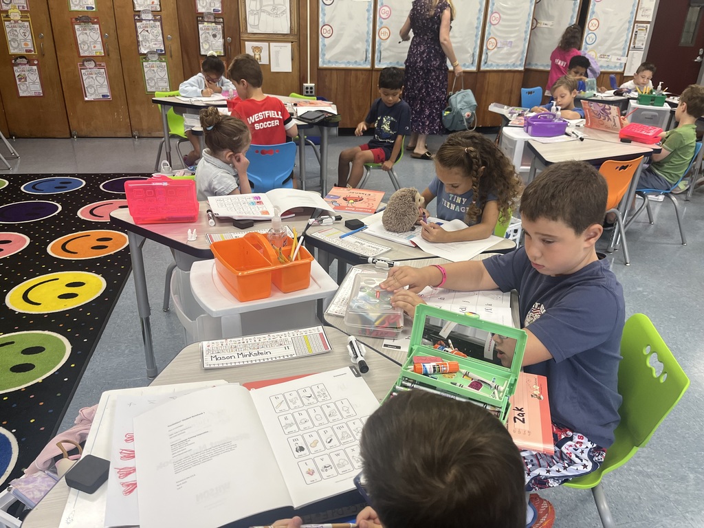 Students working on their Fundations letters.