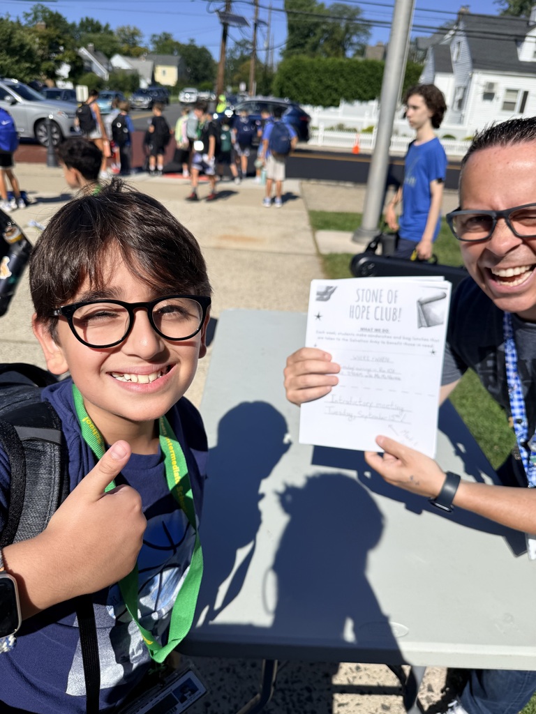 teacher and student smiling