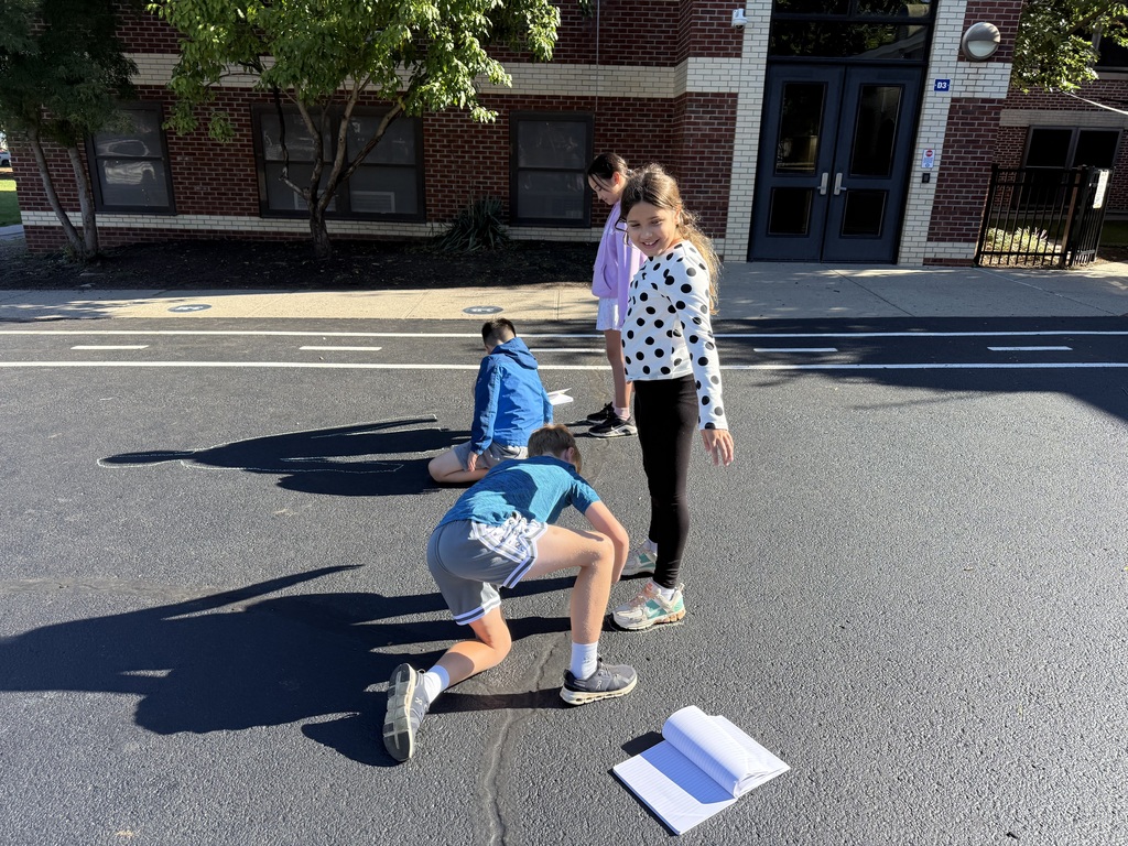 Students tracing shadows