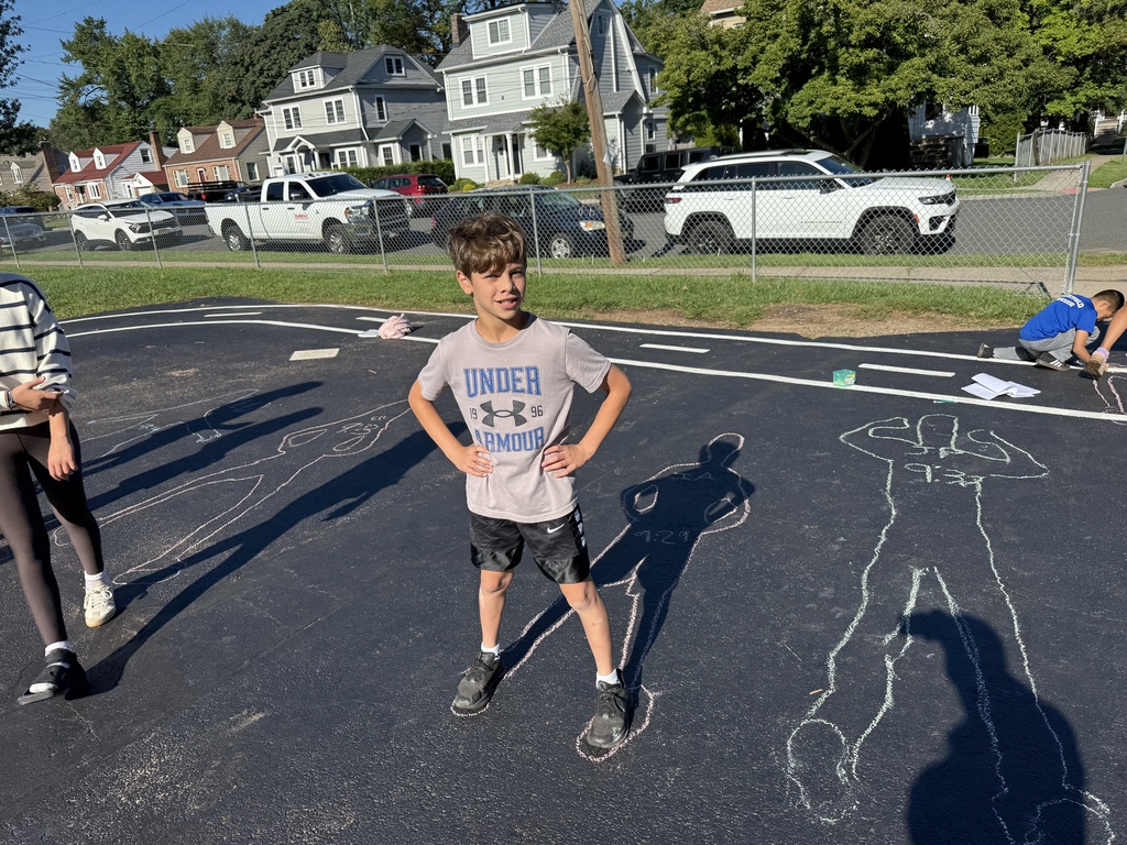 Students tracing shadows