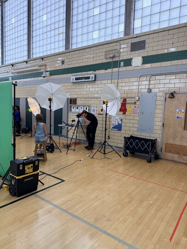 student posing for a photographer