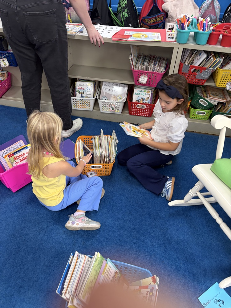 student selecting books
