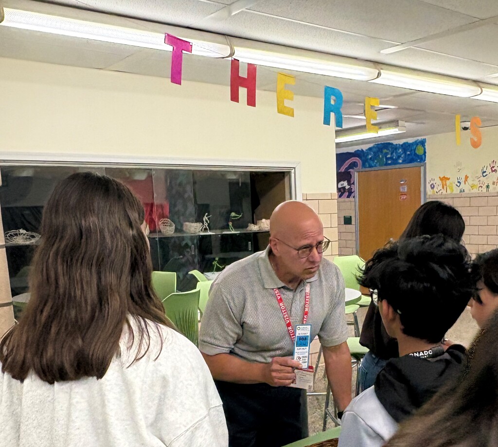 Caring Contact talking to students