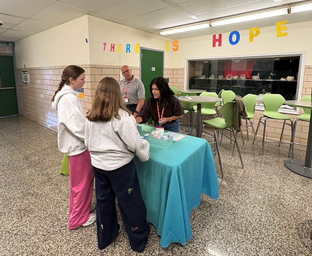 Caring Contact talking to students