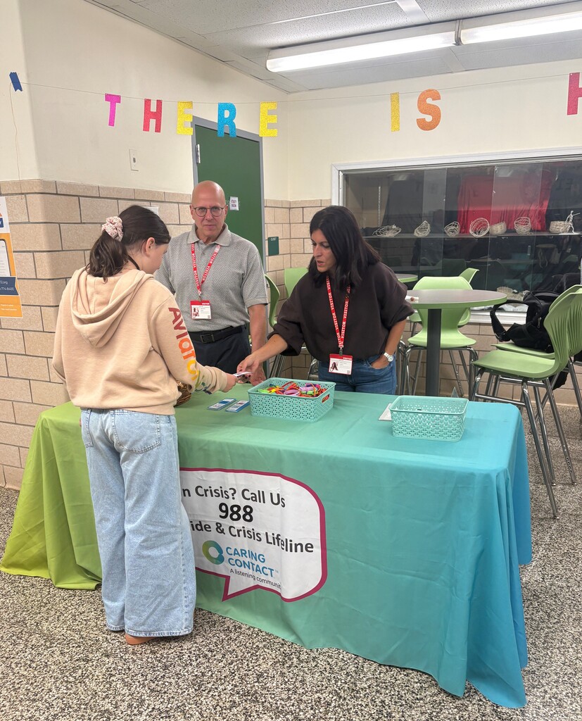 Caring Contact talking to students
