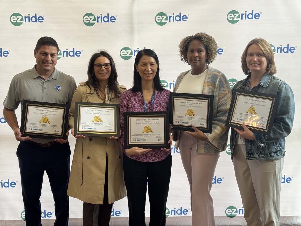 Photo of Westfield School Principals displaying their SRTS certificates.