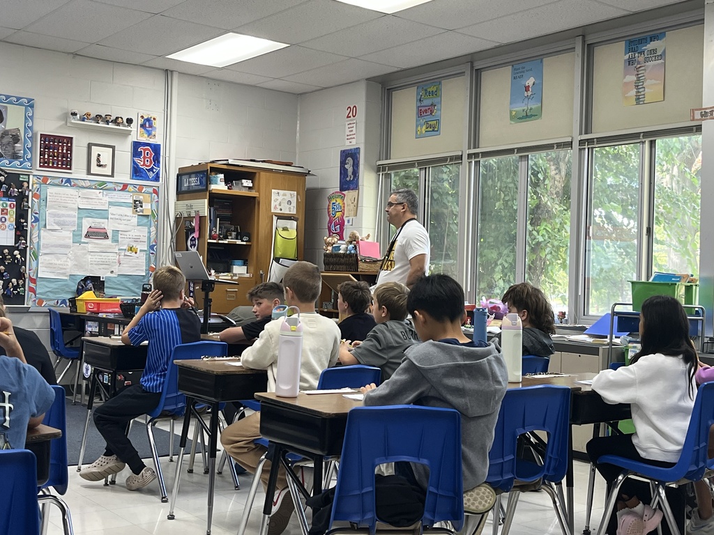Students listening to the teacher.