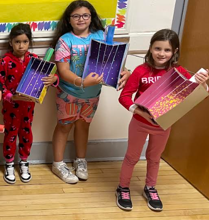 Students with hand made guitars