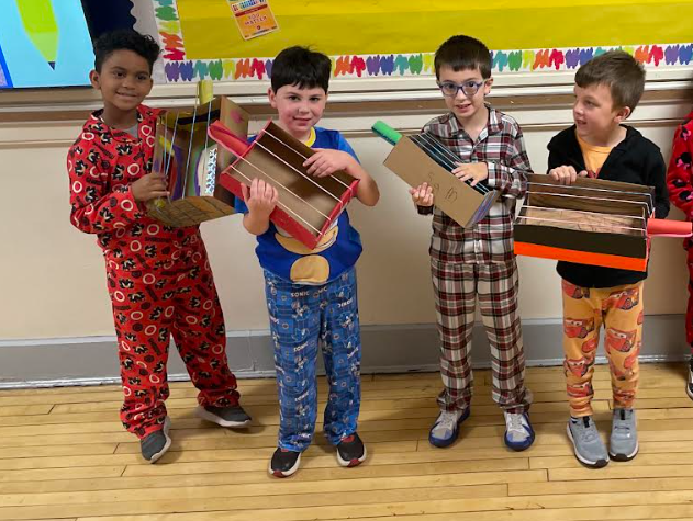Students with hand made guitars