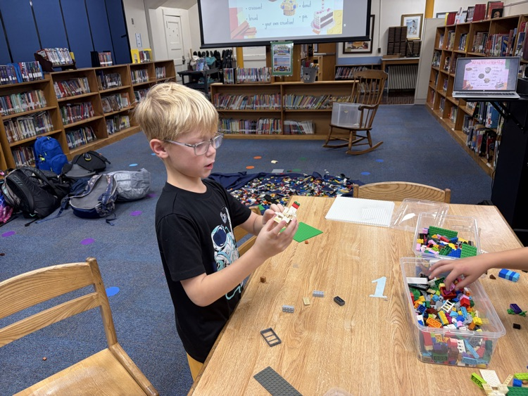student in Lego building class