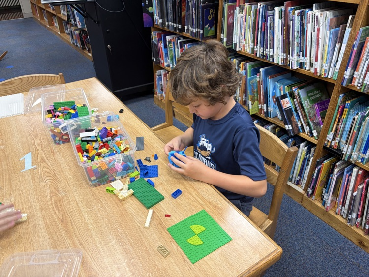 student in Lego building class