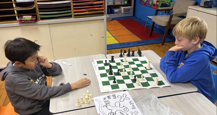 Students playing chess