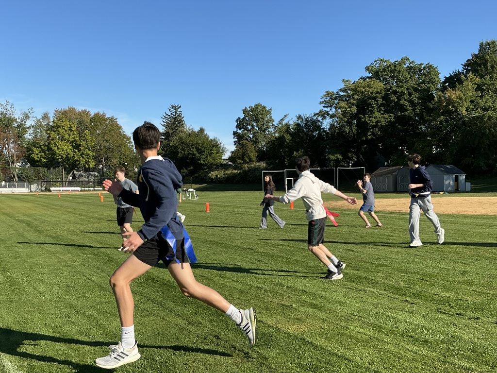 Students in PE and Physics class outside.