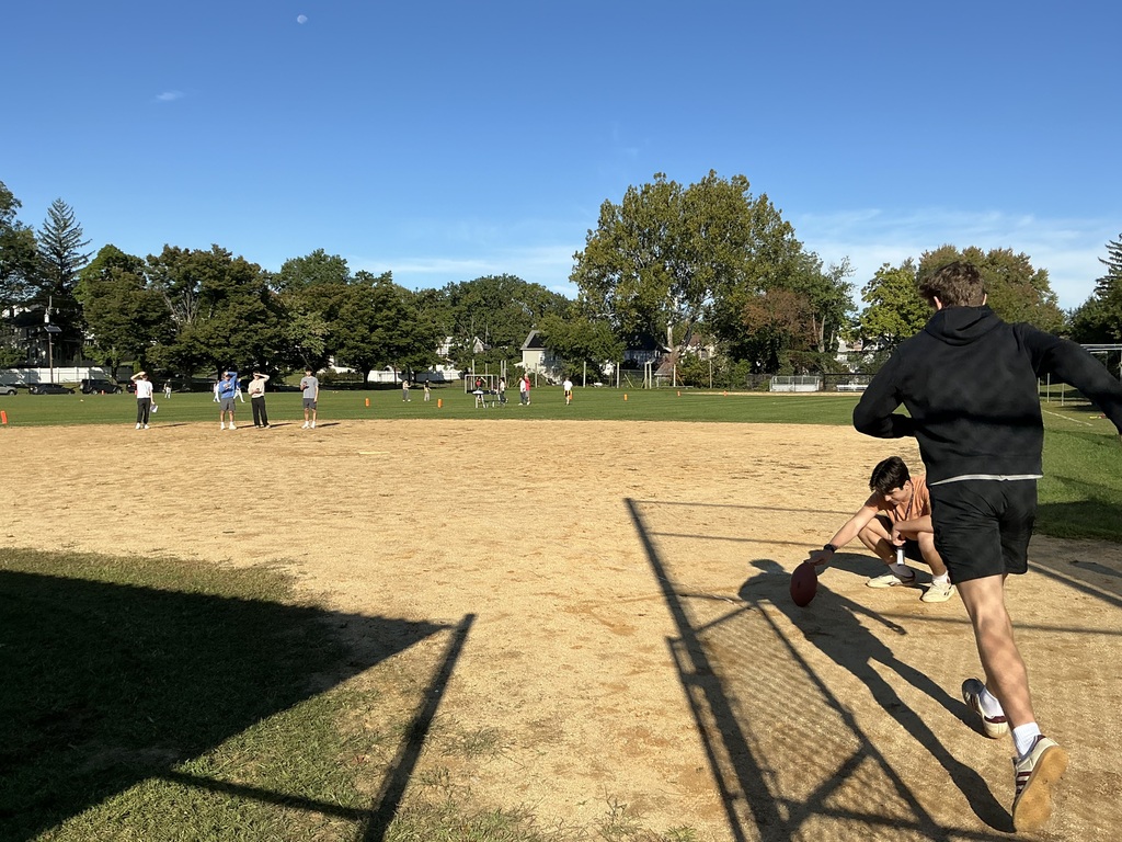Students in PE and Physics class outside.