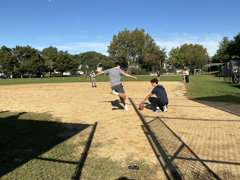 Students in PE and Physics class outside.
