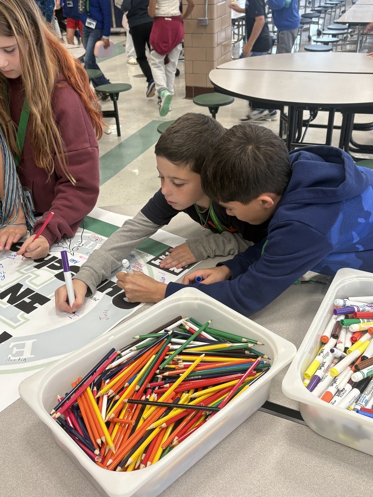Students sign poster