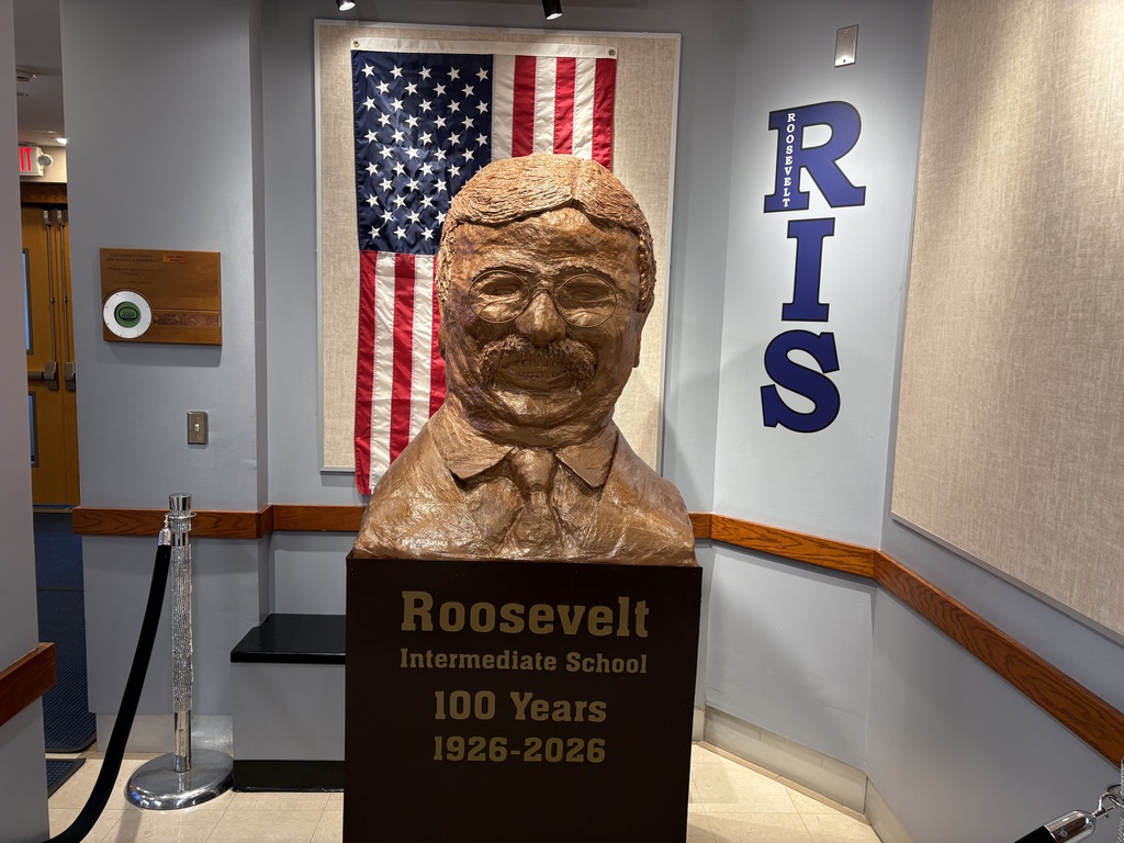 🎉💙💛 RIS is getting ready to celebrate 100 YEARS! A HUGE shout-out to Mr. Greenwood for his incredible, life-like creation of Theodore Roosevelt! 🎩👏 What an amazing addition to our centennial celebration! We can't wait for our students and staff to see this masterpiece and capture some memorable photos! 📸🎂