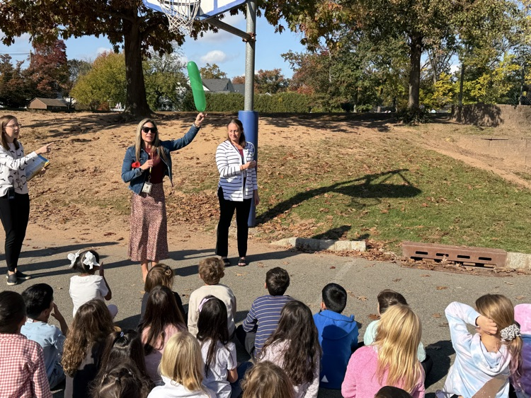 students observing a science lesson on air 