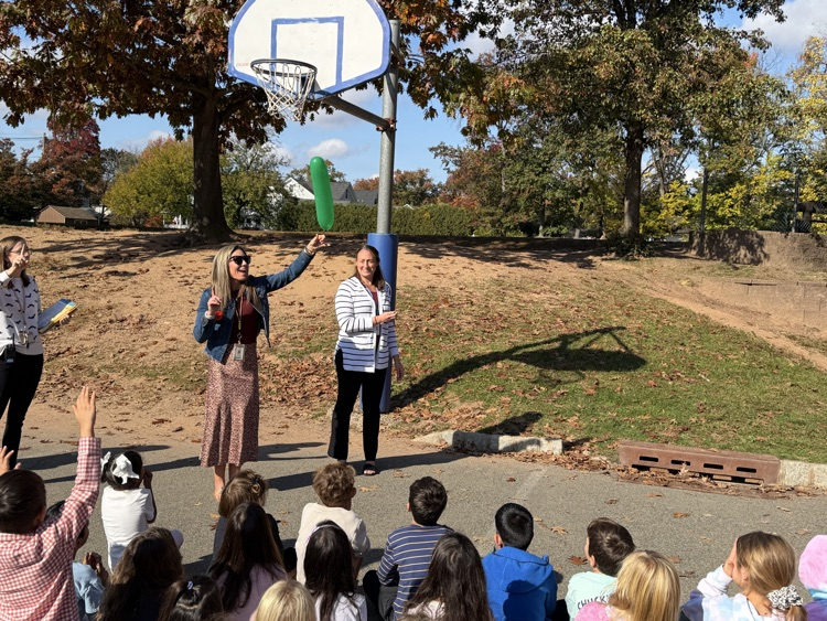 students observing a science lesson on air 