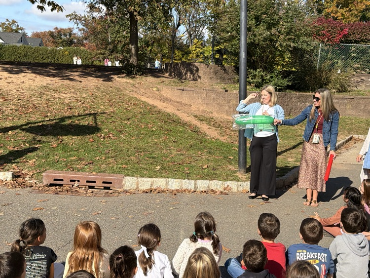 students observing a science lesson on air 