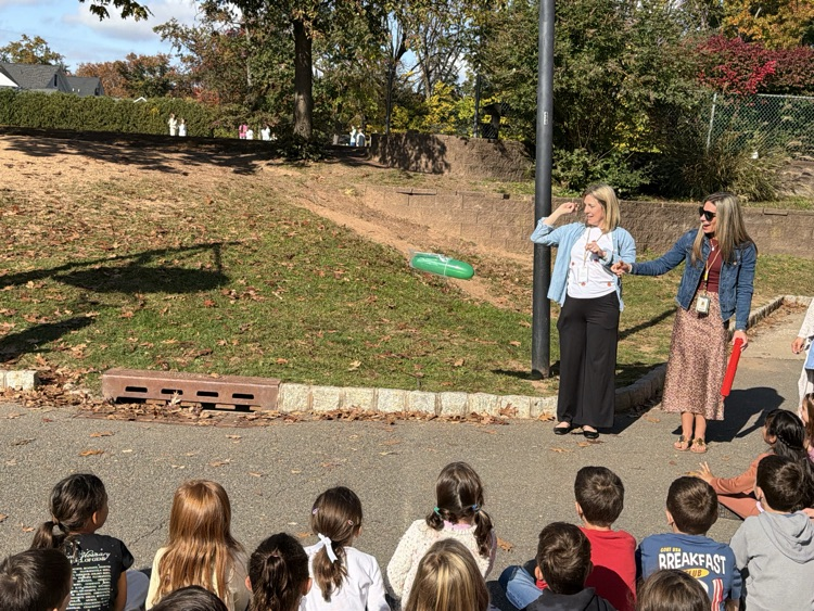 students observing a science lesson on air 