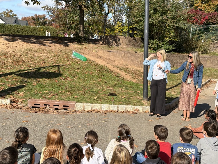 students observing a science lesson on air 