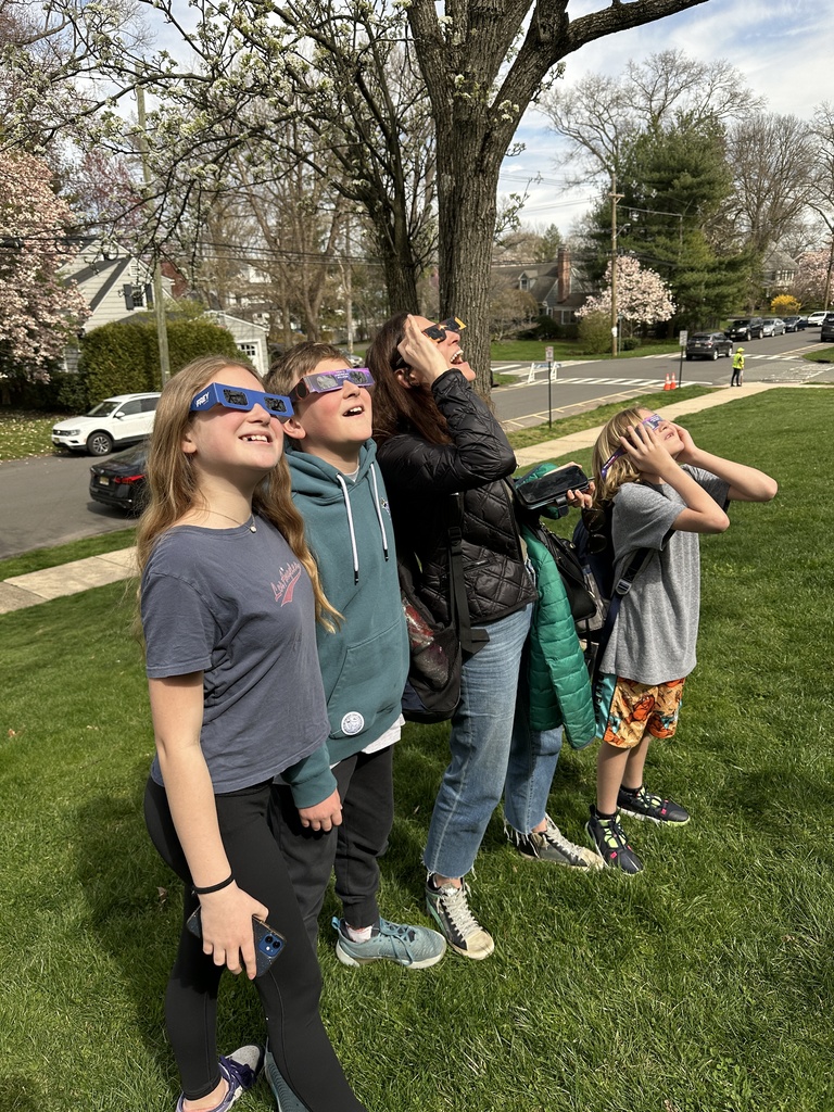 a Wilson family observing the solar eclipse