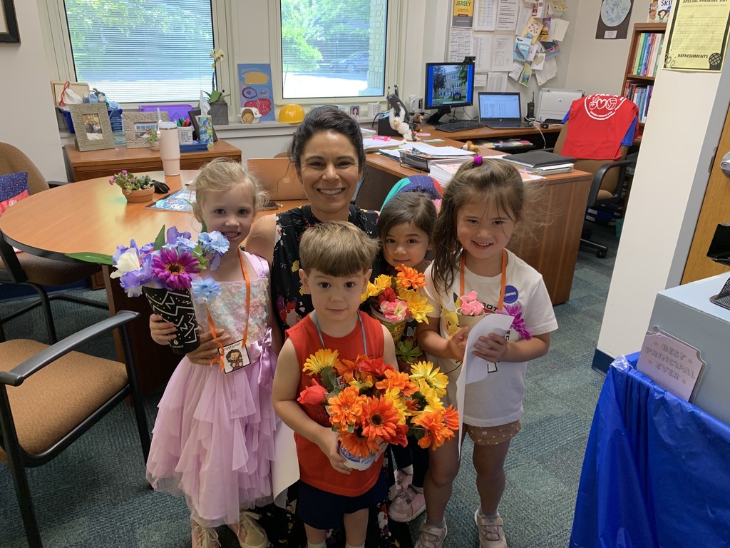 students deliver bouquets from their flower shop dramatic play center