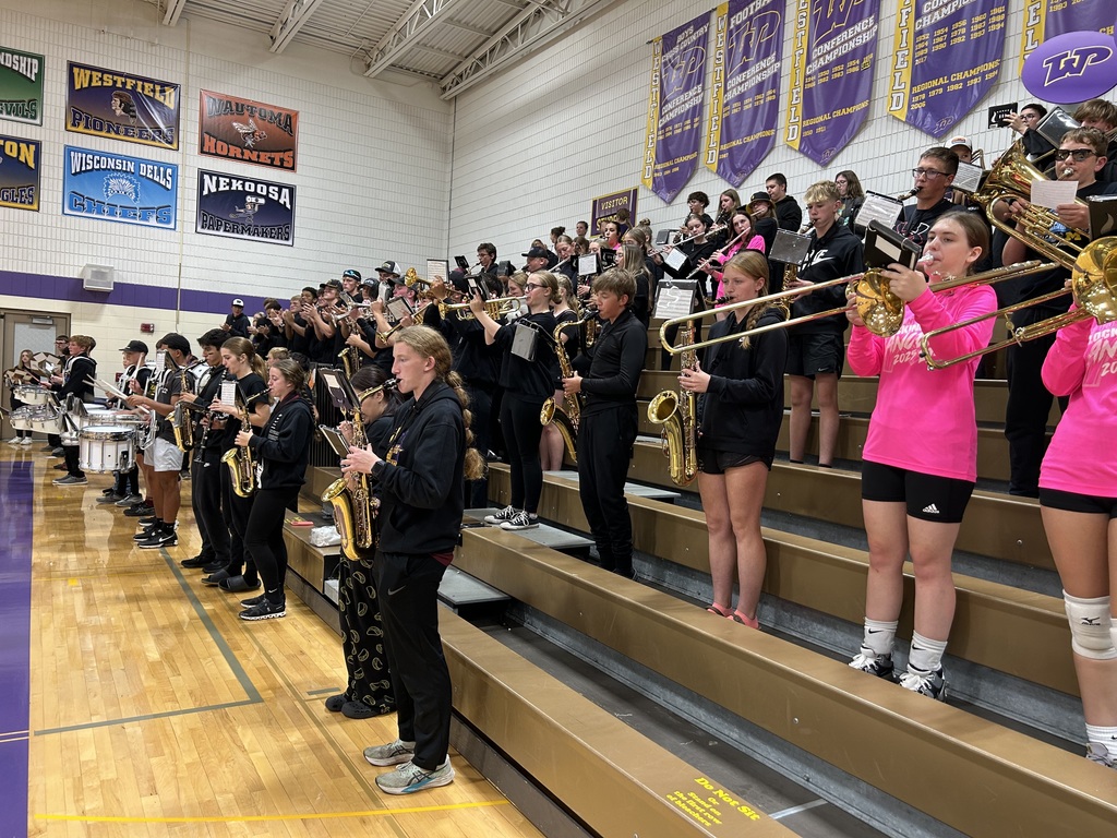 Pep Band performs in "Black Out" attire for Volleyball game versus St. Ambrose.