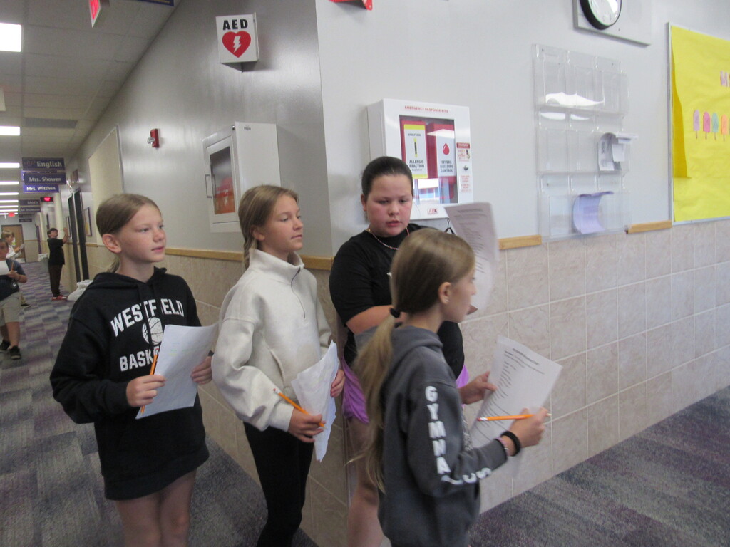 6th graders on a scavenger hunt